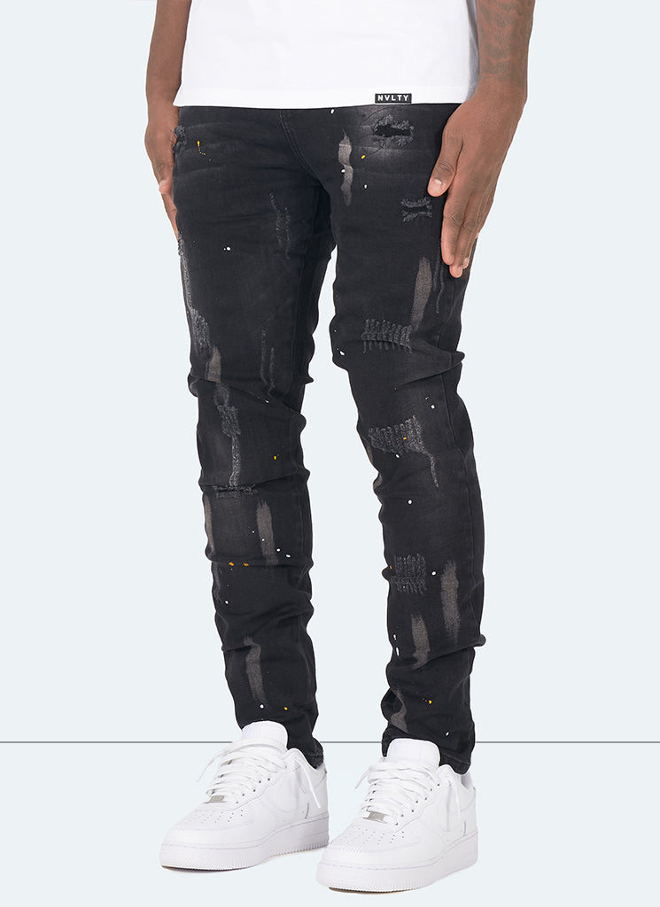 Distressed Paint Jeans – Schwarz