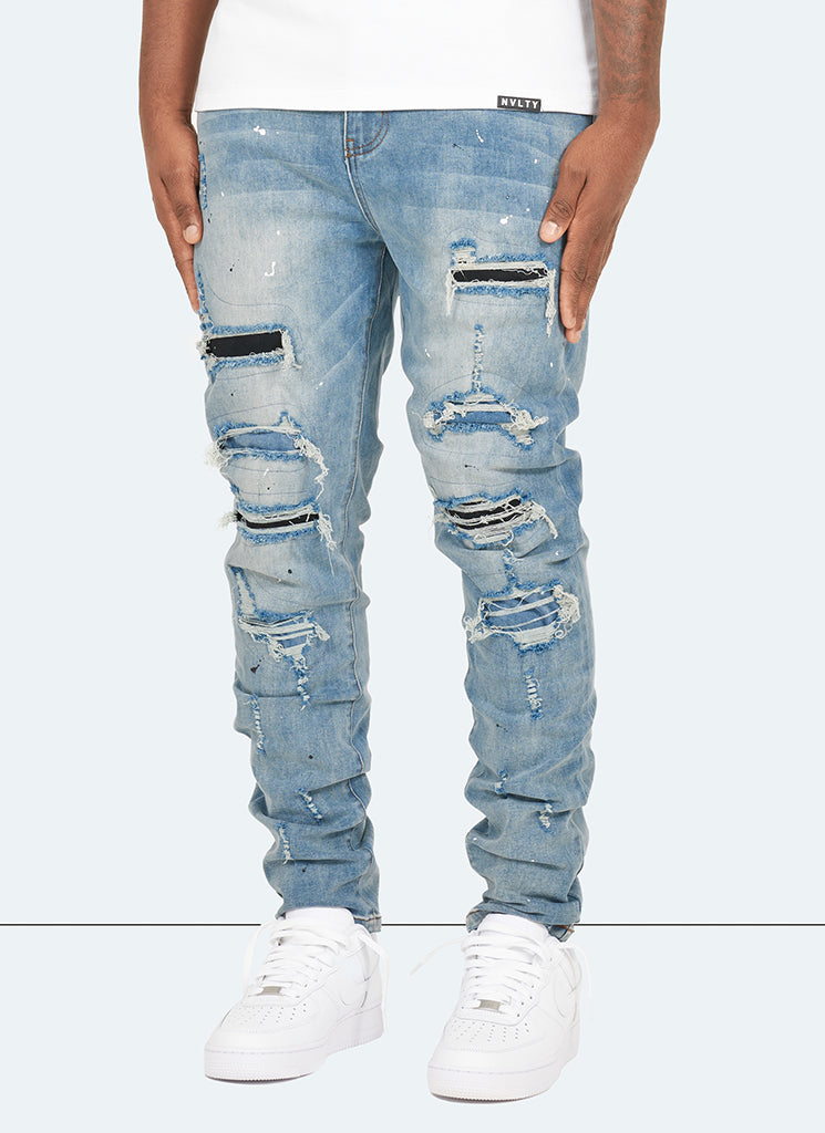 Reparierte Lackjeans – Hellblau