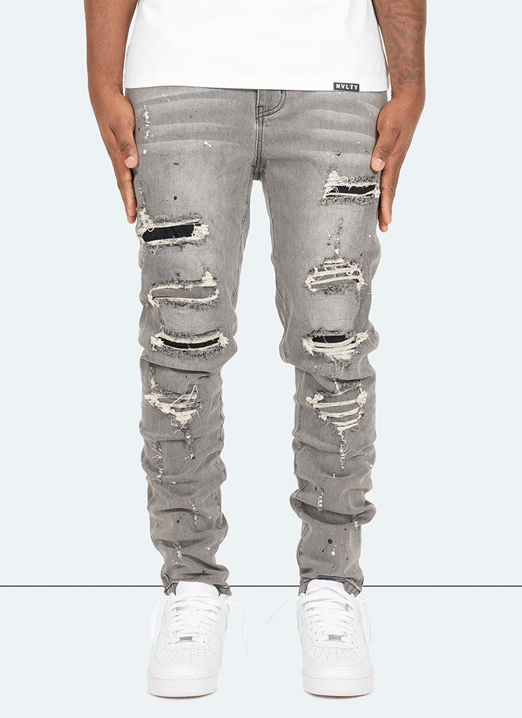 Reparierte Lackjeans – Hellgrau