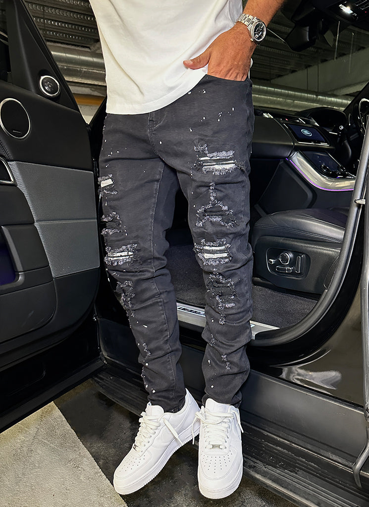 Reparierte Lackjeans – Schwarz